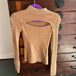 Sparkly tan sweater with cut out from Bebe